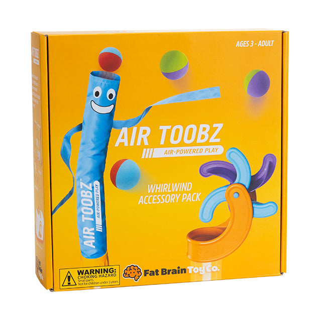 Yellow box featuring a blue tube character, colorful balls, and a purple and light blue spinning wheel accessory.