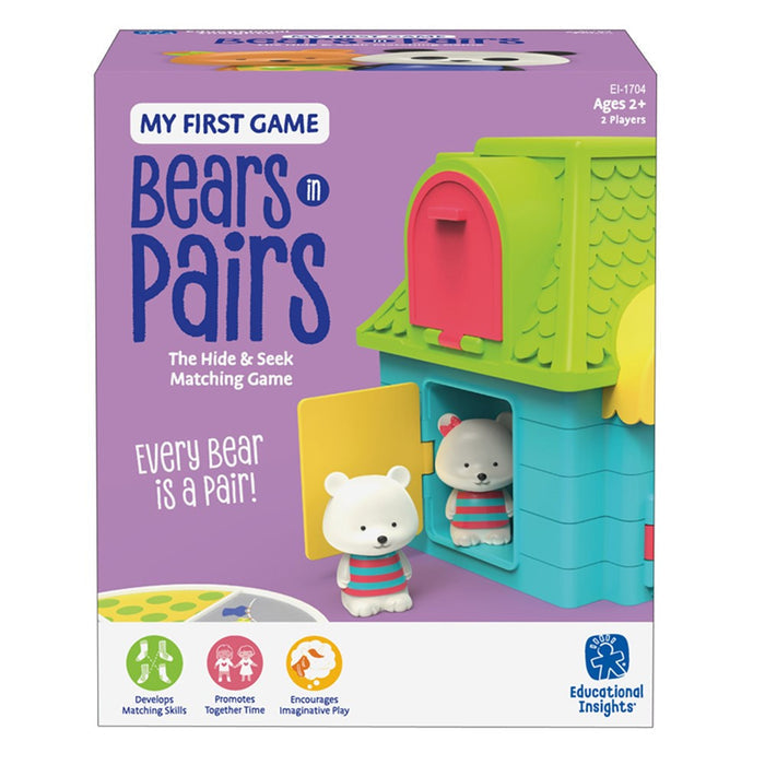 Purple game box featuring a blue and green house toy with two white polar bear figurines in red and blue striped shirts.