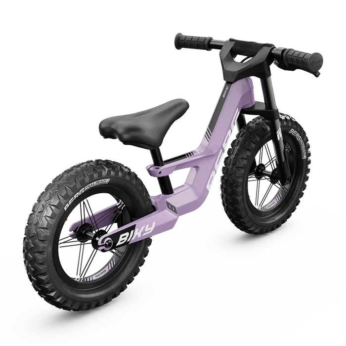 Purple balance bike with chunky off-road tires, a black seat, and a sleek frame on a plain white background.