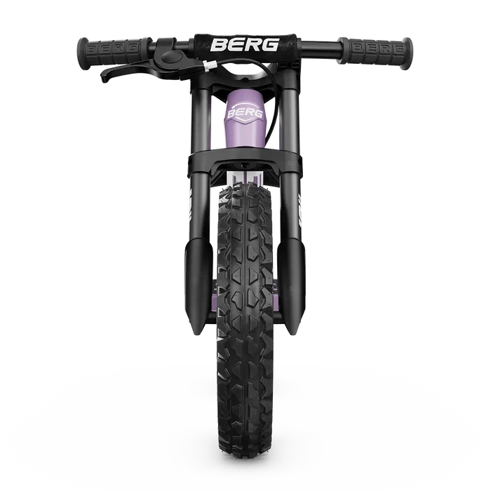 Front view of a purple BERG balance bike with rugged off-road tires and a black handlebar featuring a handbrake.