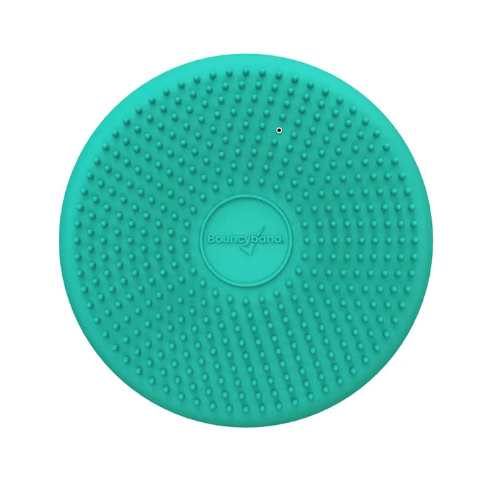Teal round sensory cushion with a bumpy, textured surface and the Bouncyband logo in the center.