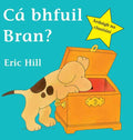 Teal book cover showing a yellow puppy with brown spots looking into an open wooden chest beside a yellow star.