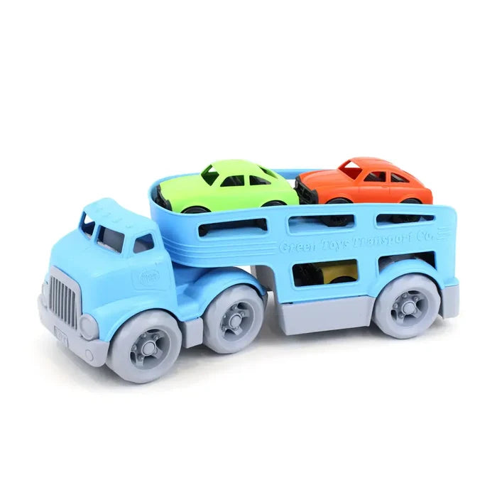 Light blue toy car carrier truck with lime green and orange cars on the top deck and sturdy grey wheels.