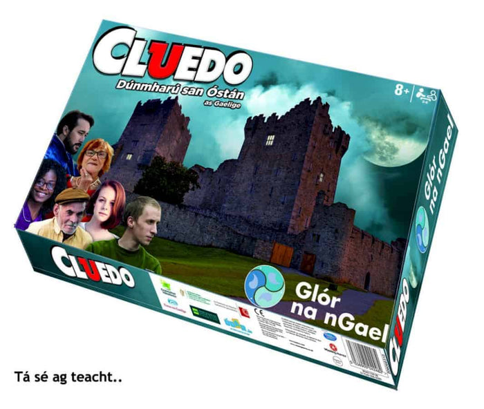 Rectangular board game box for Cluedo in Irish featuring a moonlit stone castle and six character portraits.