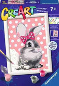 CreArt paint by numbers kit box featuring a bunny with a pink bow, polka dot background, paint pots, and a brush.