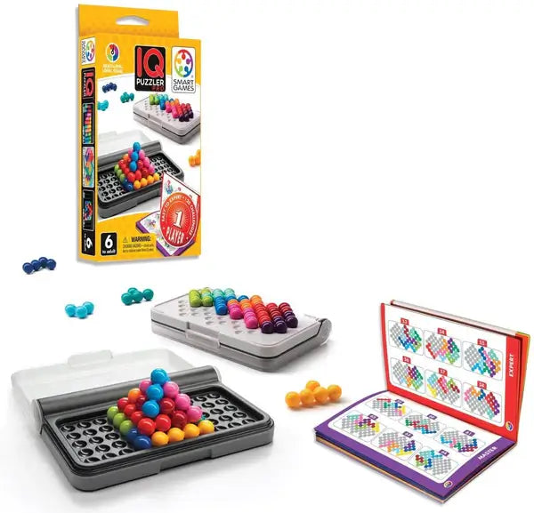 IQ Puzzler Pro game set with colorful ball puzzle pieces, two grey plastic cases, and a challenge guide booklet.
