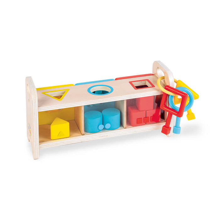 Wooden shape sorter box with yellow, blue, and red blocks and slots, plus three large colorful plastic keys on a ring.