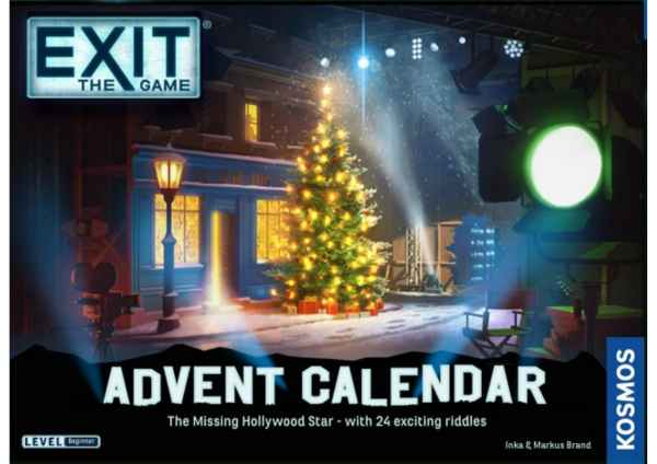 Box art showing a glowing Christmas tree on a snowy film set at night with blue stage lights and a vintage camera.