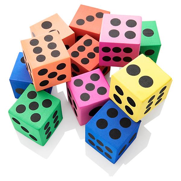 A pile of twelve colorful foam dice in pink, blue, orange, yellow, and green with large black dots.