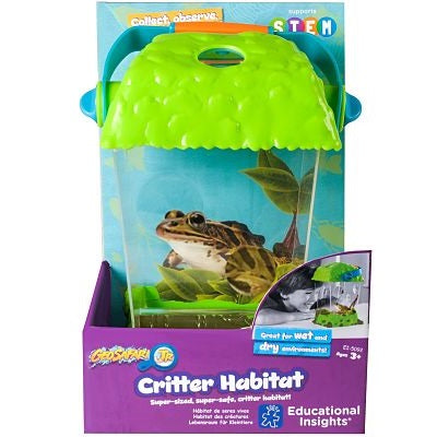 Clear bug habitat with a textured green lid and orange handle, shown in its purple and blue retail packaging.