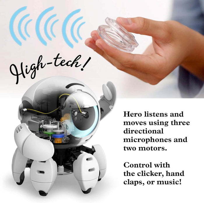 White spherical robot with visible internal gears next to a hand holding a clear sound-emitting clicker.