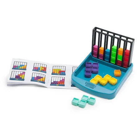 Teal Kanoodle Gravity game with colorful blocks stacked in a black vertical grid next to an open instruction booklet.