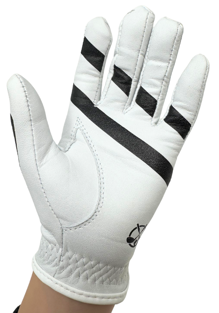 White leather kids' golf glove with black alignment stripes on the palm and fingers for grip training.