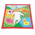 Brightly colored square farm playmat with a red border, featuring illustrations of a cow, horse, pig, and duck.
