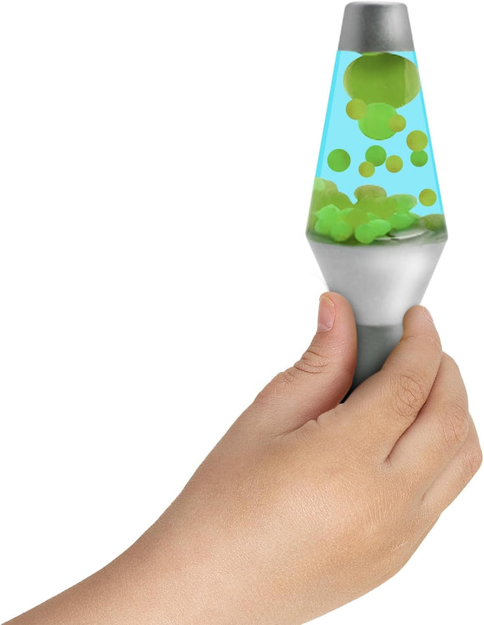 Hand holding a lava lamp-shaped sensory toy with light blue liquid and neon green squishy beads inside.