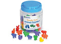 Clear jar of bright plastic farm animal figures including horses, sheep, cows, pigs, and rabbits.