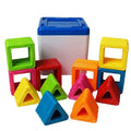 Stacks of colorful, hollow square and triangle magnetic pieces with a white storage bin and blue lid.