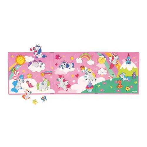 Foldable pink magnetic storybook with colorful unicorn, rainbow, and star magnets on a decorated fantasy landscape.