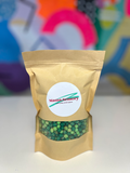 Kraft paper pouch with a clear window showing green chickpeas and a white Mama.Sensory brand label.