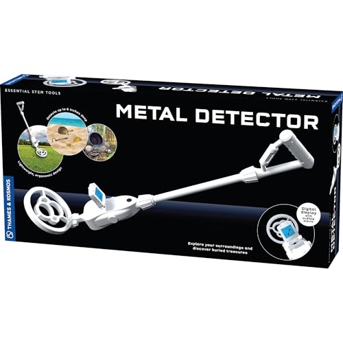 White toy metal detector on its black packaging box with circular photos of beach and woods treasure hunting.