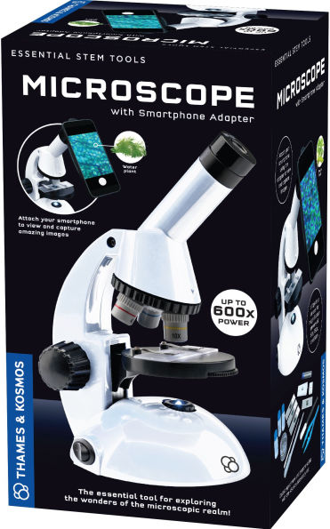 White microscope with smartphone adapter on black box, featuring 600x power callout and Thames & Kosmos branding.