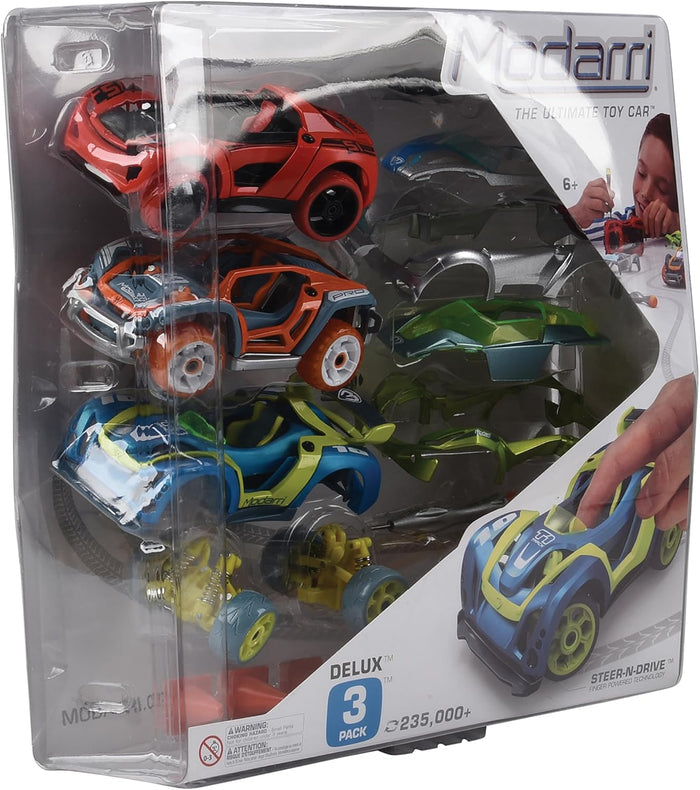 Three modular toy cars in red, orange, and blue with extra green and silver parts in a clear plastic display box.