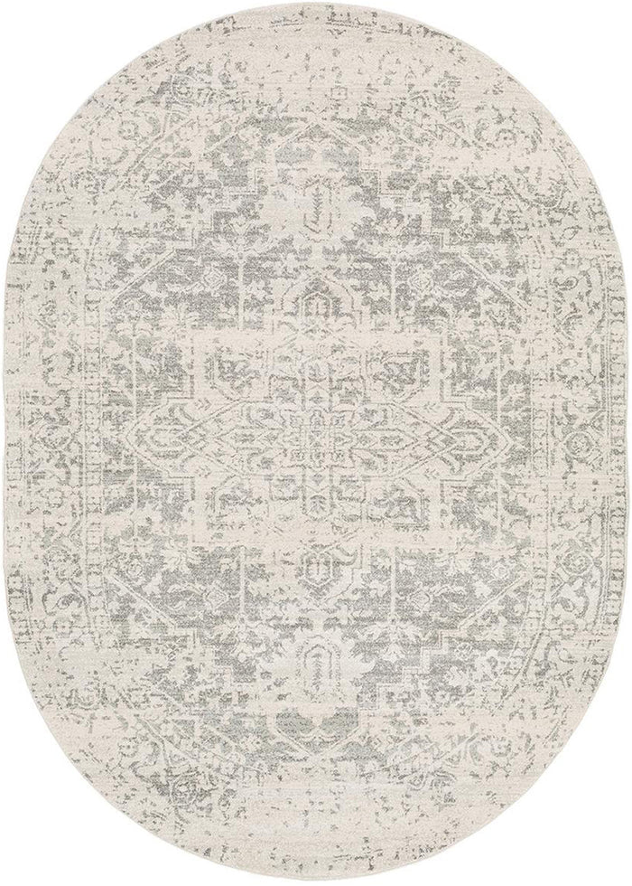 Naitee Light 6'7" x 9' Oval Rug