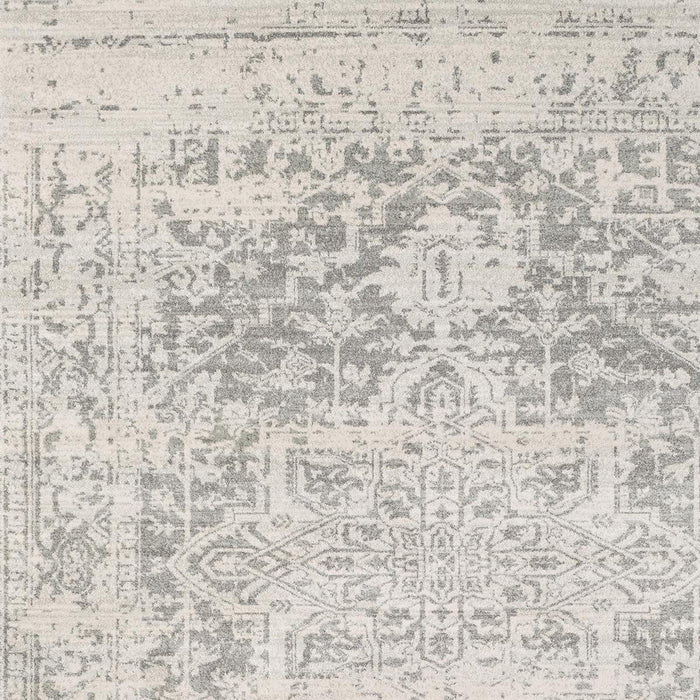 Naitee Light 6'7" x 9' Oval Rug