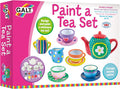Pink box featuring a colorful hand-painted miniature ceramic tea set and a palette of 12 bright paint pots.