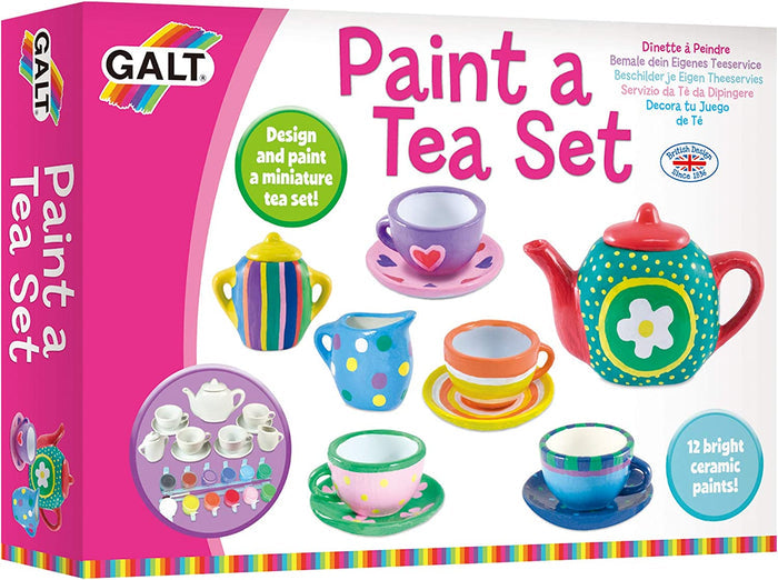 Pink box featuring a colorful hand-painted miniature ceramic tea set and a palette of 12 bright paint pots.