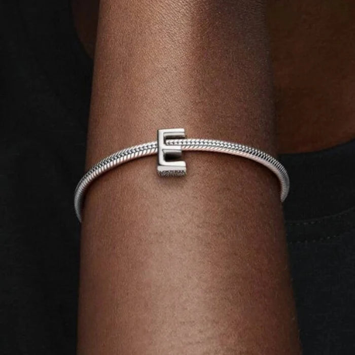 This Pandora Letter Charm - “E” adds a personal touch to your jewelry collection.