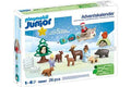 White toy box featuring Santa in a plane, forest animals, and figures in a snowy winter landscape.