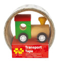 Small wooden toy train with red roof and green body inside a roll of road tape on a red cardboard display base.