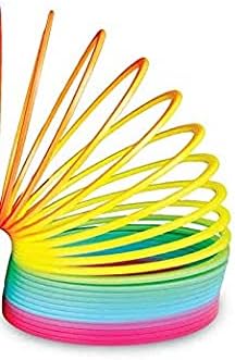 Rainbow gradient plastic coil toy with pink, blue, green, and yellow rings, shown partially expanded.