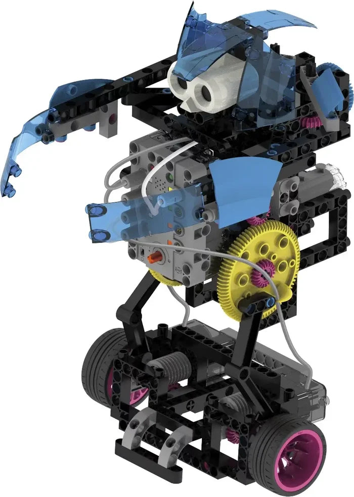 Robot toy with black frame, blue panels, large yellow gears, pink-rimmed wheels, and white eyes.