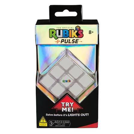 Rubik's Pulse game in black and holographic packaging with a white-tiled cube visible through a diamond cutout.