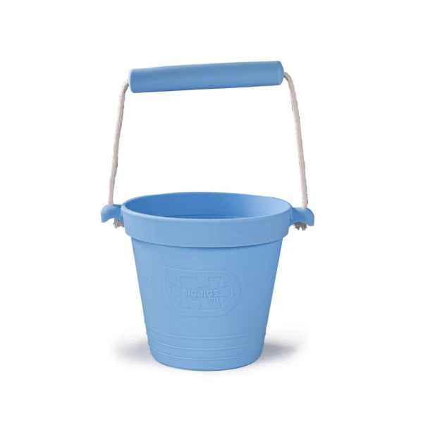 Light blue silicone bucket with a rope handle, blue cylindrical grip, and ridges around the base.