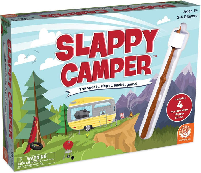 Game box with a yellow camper in a forest, red title text, and a white marshmallow slapper stick tool.