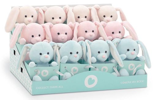 Retail display of pink and light blue soft plush bunnies with long ears, each sitting in a small gift bag.