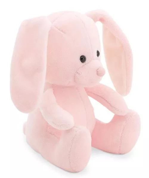 Soft, light pink plush bunny toy with long floppy ears and small black bead eyes in a sitting position.
