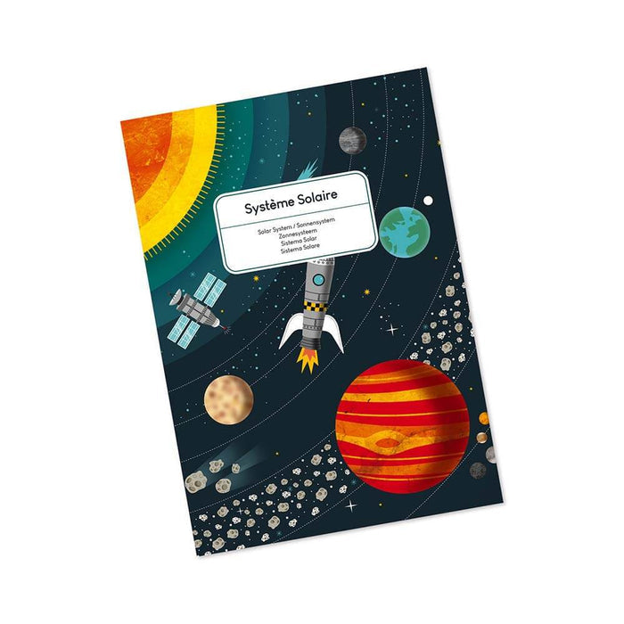 Space puzzle box featuring colorful illustrations of a rocket, sun, and planets against a dark starry sky and asteroids.