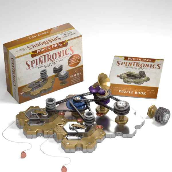 Box and book beside a mechanical circuit of gold hexagonal bases, tiered gears, black chains, and a small purple horn.