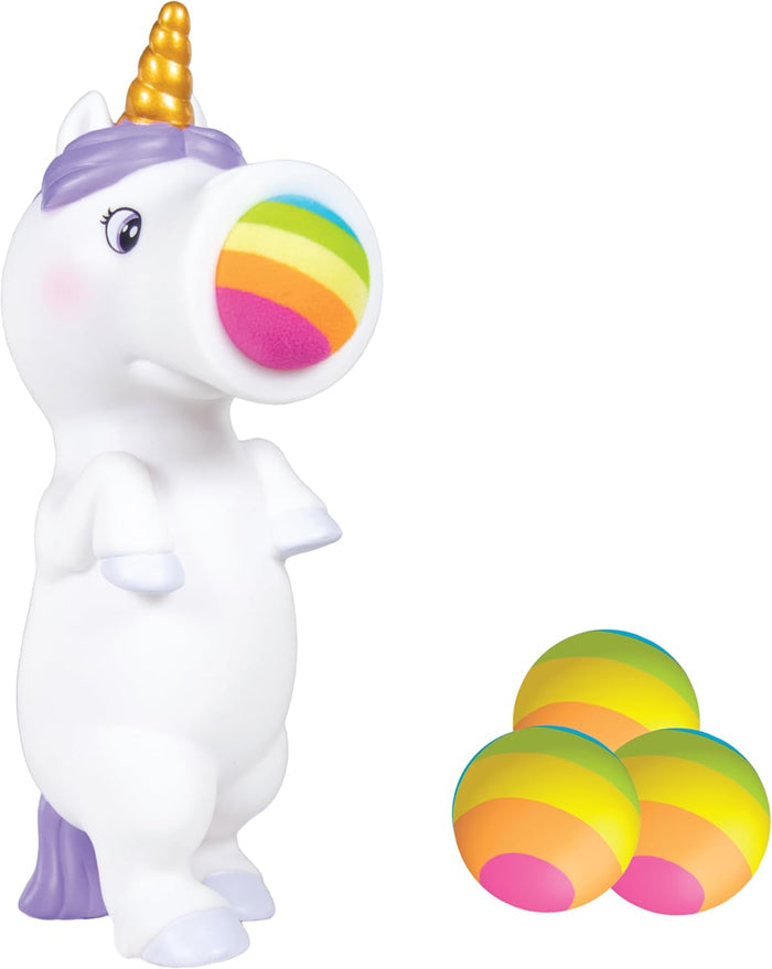 White unicorn squeeze toy with gold horn and purple mane, featuring four rainbow foam balls, one loaded in the snout.