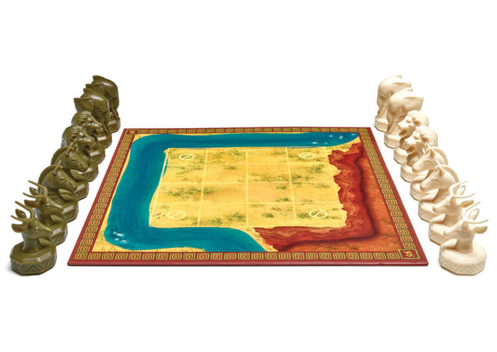 Savanna grid game board flanked by sets of dark green and ivory carved animal-head playing pieces.