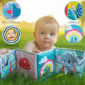 Baby peeking over a colorful soft book with a koala and mushroom. Circles highlight mirror, crinkle, and sensory features.