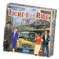 Ticket to Ride New York board game box with a 1960s city scene featuring a yellow taxi, bus, and people in vintage dress.