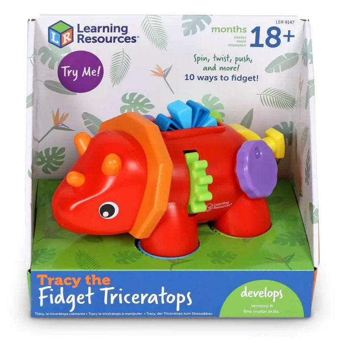 Red triceratops toy in box with colorful fidget features like a green gear, purple spinner, and blue buttons.