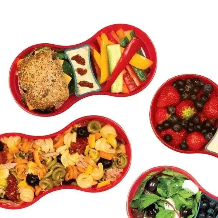 Red kidney-shaped lunch boxes filled with pasta, fruit, and veggies, featuring a small dipping pot separator.