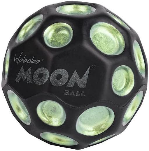 Black textured bouncy ball with shimmering pale green crater indentations and a silver Waboba Moon Ball logo.