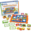 Orange game board with illustrated child face cards, green prompt cards, and emoji discs shown with the product box.